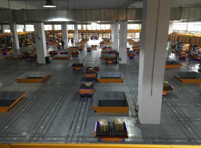 “雙11”分揀機(jī)器人挑大梁，30秒分好一件快件