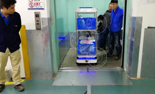 AGV小車自動(dòng)乘坐電梯是如何做到的?
